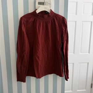 Madewell Burgundy long sleeve blouse with ruffle neckline and puffy sleeves